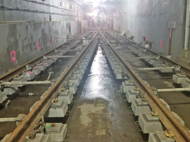 Concrete slab installation under resilient tie block rail. Resilient tie blocks are a new technology 04-19-19