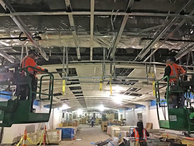 Hanging framing to support finishes going up at 46th Street in the LIRR passenger concourse. 04-19-19